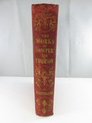 Rear red ribbed cloth board with blind-stamped decorative border and central urn motif.