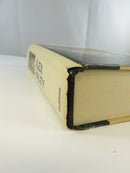 Spine and top edge view of the Roots hardcover in its dust jacket, with Alex Haley and Doubleday visible.