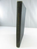 Worn lower spine and page edge of the hardcover