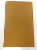 Plain orange rear paper cover of the staple-bound pamphlet.