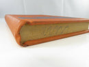 Lower page edge with pencil marks and worn orange cloth