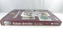 Spine and top edge view of the hardcover jacket for Estate Jewelry 1760-1960, showing title, author surname, Schiffer imprint, and 2nd Edition logo.