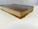 Lower page edge and worn leather board corners of the half-leather Prince Otto hardcover.