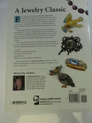 Back cover of the Krause Publications paperback, with summary text, jewelry illustrations, barcode, and ISBN area.