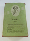 Angled view of the lower text block and red cloth boards, showing age-toned page edges and worn jacket remnants.