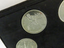 Close view of running-themed Barcelona 1992 Olympic commemorative coin