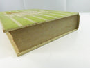Top page edge and worn upper board edge of the hardcover