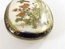 Vintage c1940 Japanese Satsuma Brooch Gold Gilding Garden Scene with Bird Signed