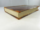 Fore-edge view of the text block and heavily worn leather board edges on Prince Otto.