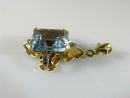 18K Yellow Gold Arts & Crafts Pendant with Emerald Cut Aqua Blue Spinel