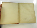Open front pastedown and free endpaper with pencil handwriting and a street-address notation.