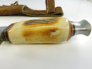 Opposite side of the bone or faux-stag handle with metal pommel