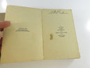 Copyright page opposite dedication to J. M. Frost, with handwritten A B Parker inscription on the front endpaper.