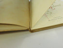 Portrait of Oliver Wendell Holmes opposite the decorative Opals From Holmes title page.