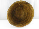 Opposite side view of the tapered round woven basket.