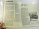 Close view of the lower cover edge and aged page block, showing wear and chipping at the wrap corner.