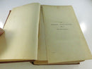 Plain brown ribbed cloth cover of one volume with visible scuffing and wear.
