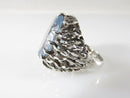 Oval Synthetic Aquamarine Set in Pierced Sterling Silver Band Statement Ring