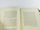 Close angled view of interior pages and the binding near page 47.