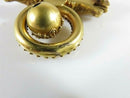 Victorian Archaeological Revival Double Griffin Brooch in Gold with Ruby Eyes
