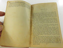 Decorative rear endpapers with Gothic architectural border design and visible hinge wear.