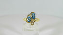 14K Yellow Gold Ring Size 6 3/4 with a Pair 6mm x 4mm Oval Cut Blue Topaz