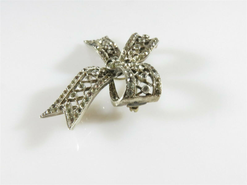 Sparkly Rhinestone Bow Brooch Sterling 2" x 1 3/8" 10.5 Grams Missing 2 Stones - Just Stuff I Sell