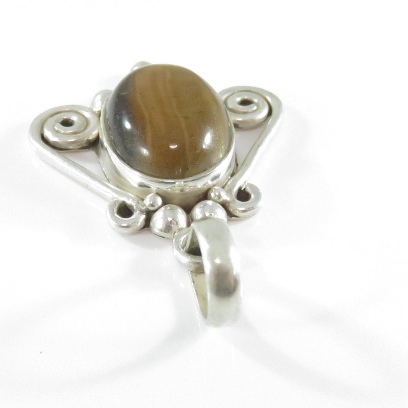 Southwestern Sterling Silver Swirl and Ball Accented Oval Polished Tigers Eye Pendant