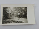 1944 Photo of Girl with Woods & Fish Pond Black & White Photograph 4 1/2" x 2 3/4" — front view