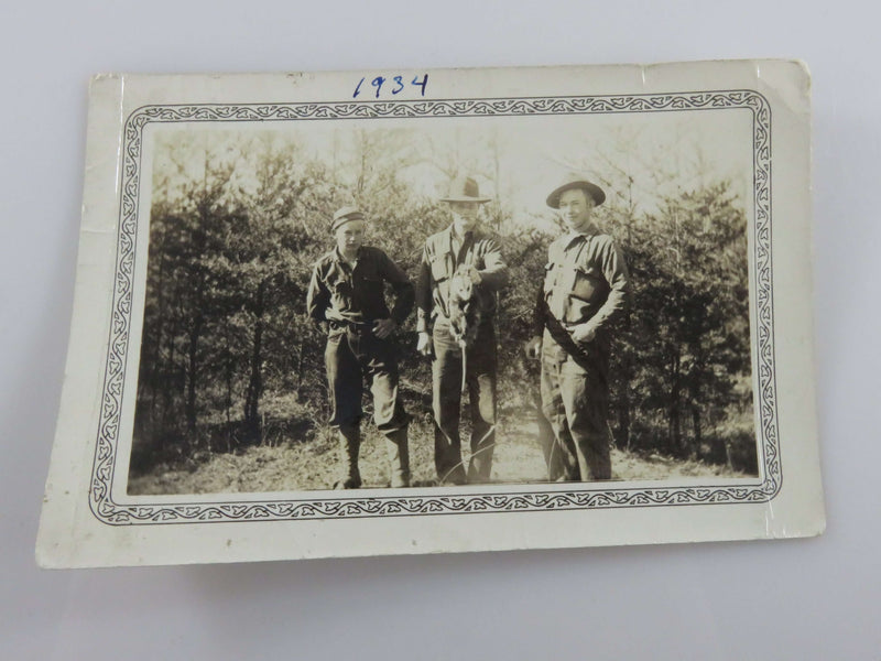 1934 CCC Men Holding Possum with Forest Background B & W Photograph 4 7/8" x 3 1/4"