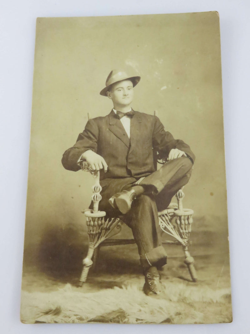 Man Wearing Suit Seated Cane Wrapped Chain Photo Postcard Circa 1920 Unused Post