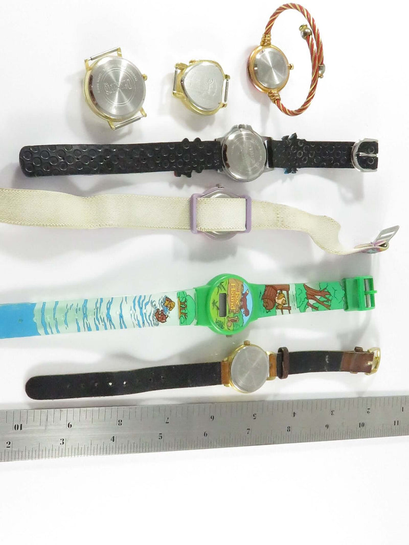 A Grouping of Character Style Watches, Lion King, Pooh, TMX Monster , Snowman