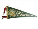 Circa 1950's 12" North Carolina State Souvenir Pennant Flag State Seal Green Felt — front view