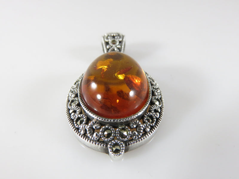 Vintage Oval Amber Pendant With Marcasite Accents in Sterling Silver by Judith Jack