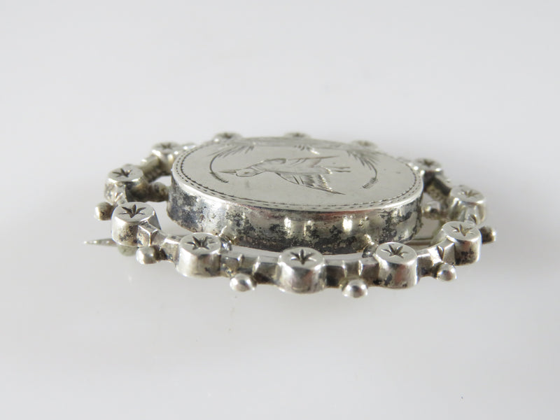 Victorian Aesthetic Movement Sterling Etched Bird Brooch with Starburst Surround